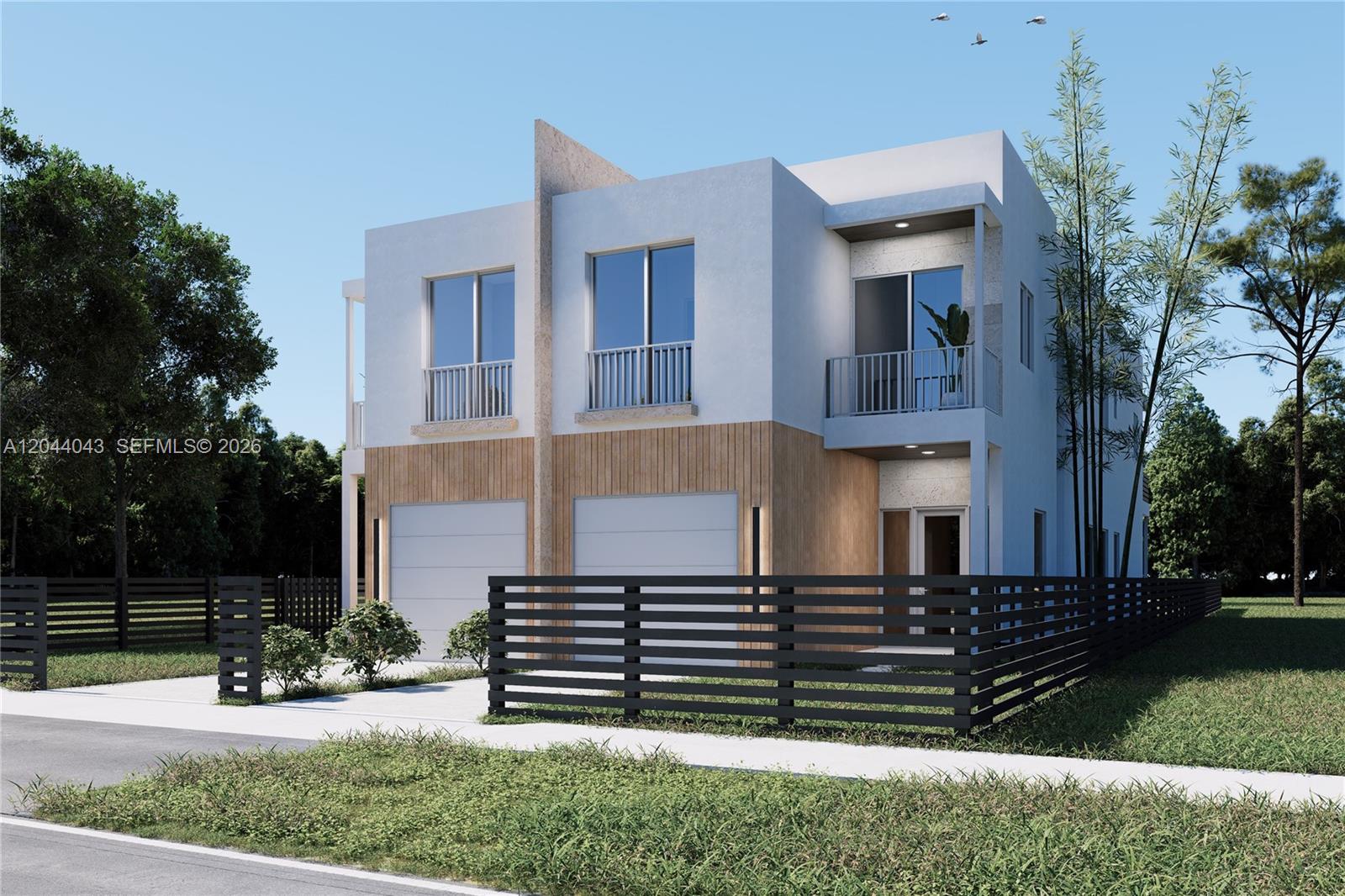 This is a rendering of a modern two-story duplex with wood siding and white stucco — 3121 SW 23rd St, Miami FL 33145, MIAMI, FL
