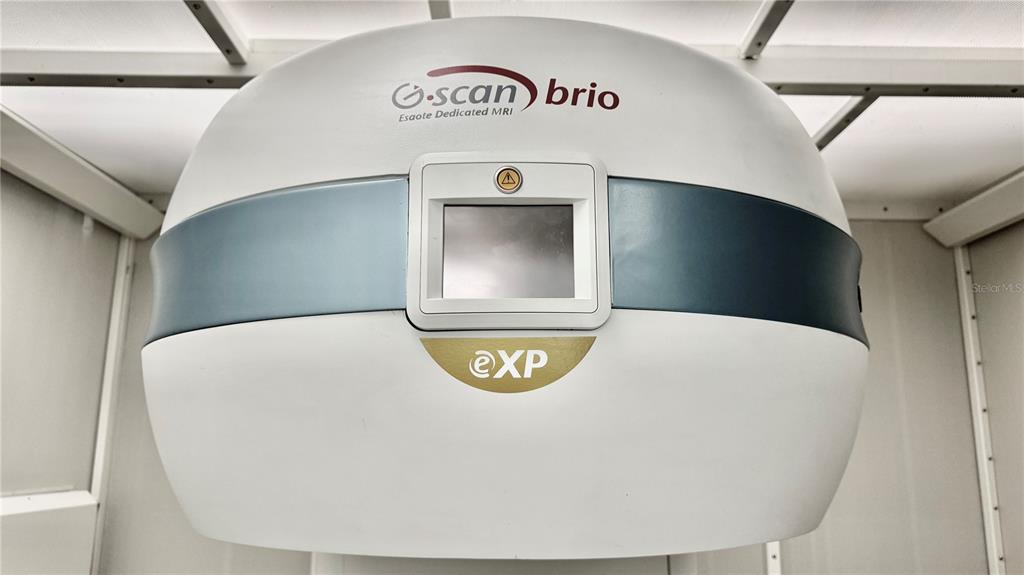 A close-up view of an Esaote G-scan brio dedicated MRI machine inside a room — 2301 STATE ROAD 524 UNIT A135, COCOA, FL