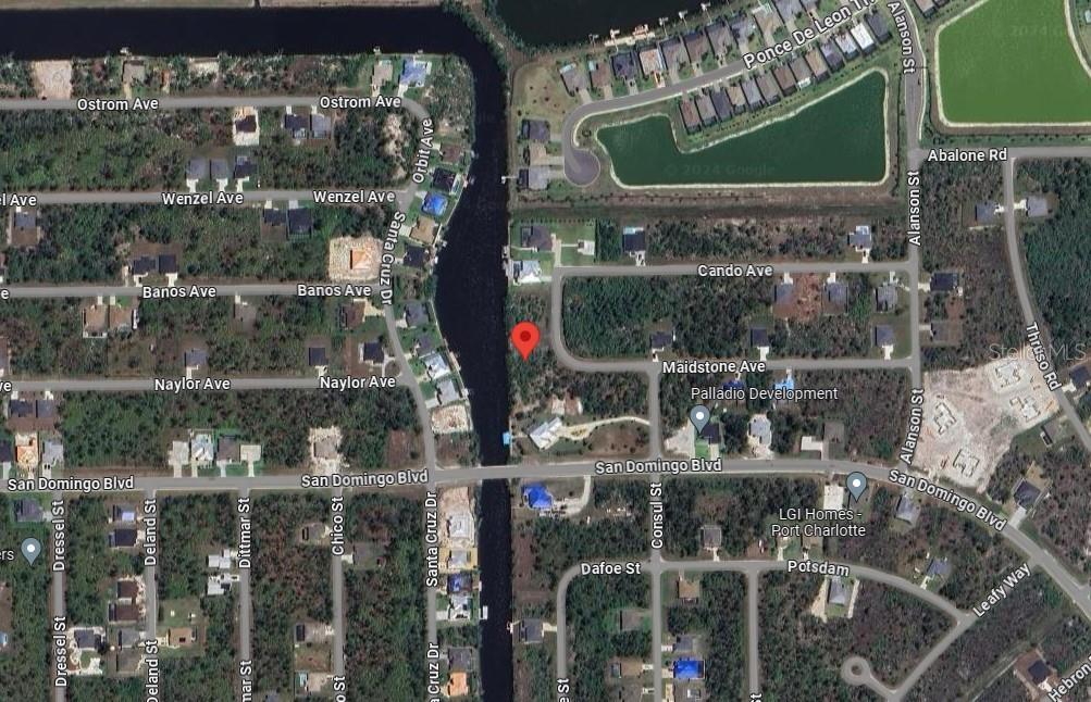 This is a satellite map view showing a residential area with a red location pin — 14284 HUMBOLD ROAD, PORT CHARLOTTE, FL