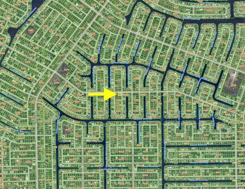 This is an aerial map showing a residential neighborhood with canals and street layouts — 9477 GALAXIE CIRCLE, PORT CHARLOTTE, FL