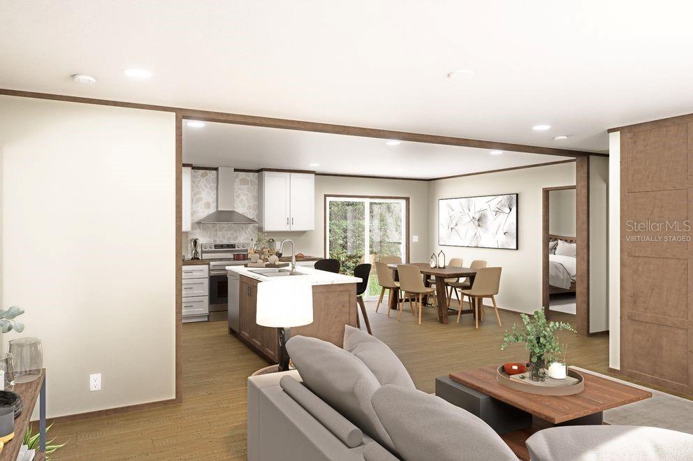 This is a digital rendering of an open-concept kitchen, dining area, and living room — 106 SUNLAND DRIVE, SATSUMA, FL