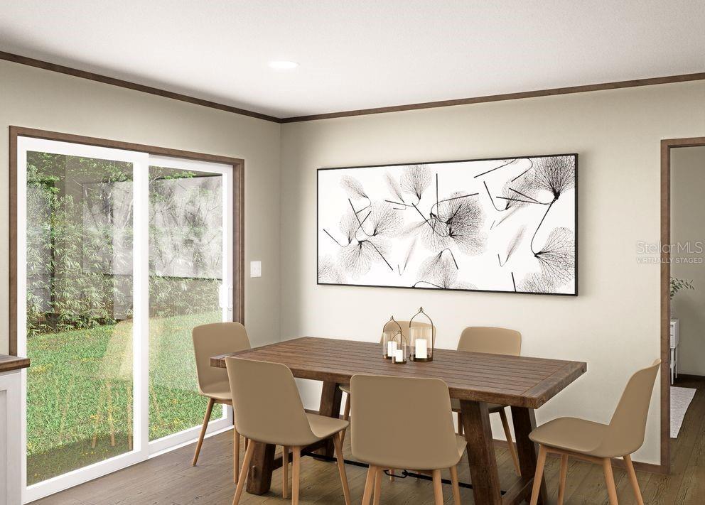 This virtually staged dining room features a wooden table, four chairs, and a sliding door — 106 SUNLAND DRIVE, SATSUMA, FL
