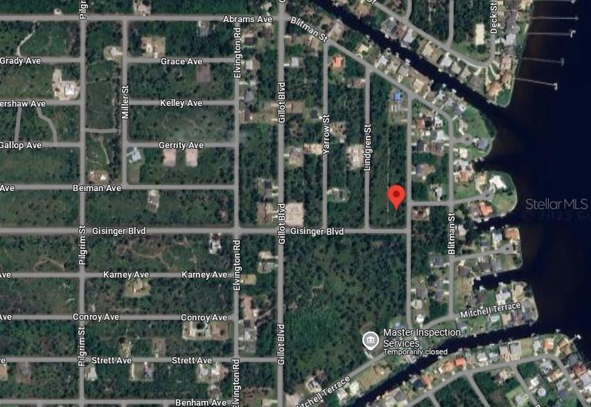 This is a satellite map showing a residential area with a red pin marking a lot — 3519 DWIGHT STREET, PORT CHARLOTTE, FL