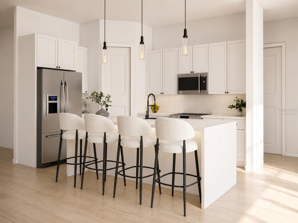 This is a rendering of a modern kitchen featuring white cabinetry, stainless appliances, and island seating — 13855 SW 33RD COURT ROAD, OCALA, FL
