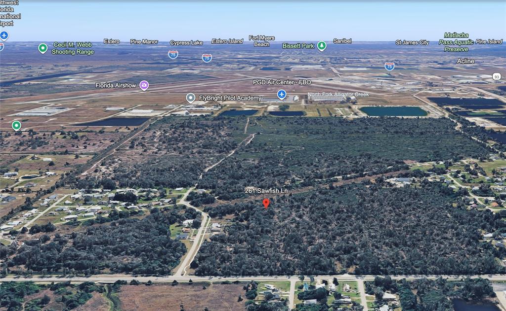 This is an aerial map view showing a wooded lot and surrounding area — 261 SAWFISH LANE, PUNTA GORDA, FL