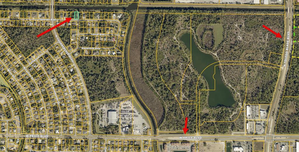 This is an aerial map showing a residential lot highlighted in a developed neighborhood — SNOVER AVENUE, NORTH PORT, FL