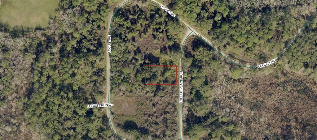This aerial map shows a rectangular plot of land outlined in red near a road — 9034-1049-03 LOCUST PLACE RUN, OCALA, FL