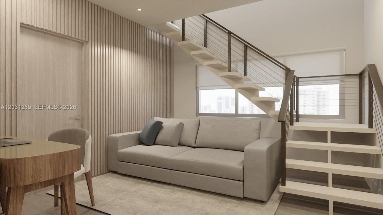 This rendering shows a modern living room with a sofa, slatted wall, and floating staircase — 250 Collins Ave # 207, Miami Beach FL 33139, MIAMI BEACH, FL