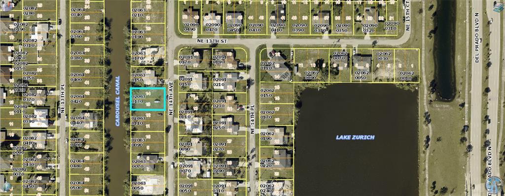 This is a map showing a vacant residential lot highlighted in blue near a canal — 1226 NE 14TH AVENUE, CAPE CORAL, FL