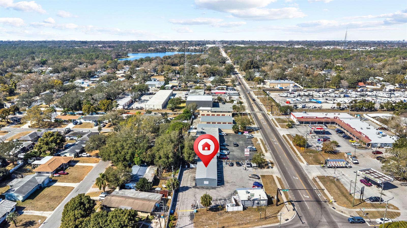 An aerial view shows a commercial storage facility with a red location pin — 11500 Walsingham Road, Largo FL 33778, LARGO, FL