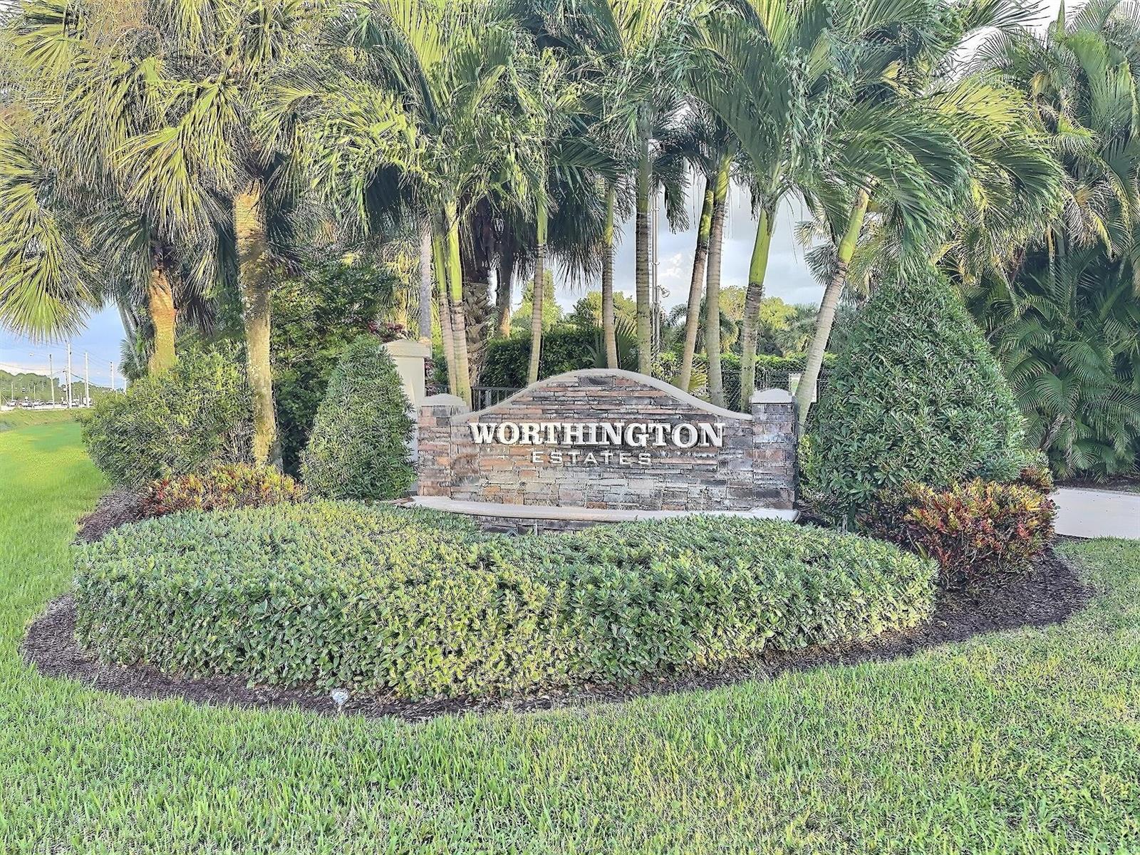 A stone monument sign for Worthington Estates stands surrounded by palm trees and landscaping — 9183 Nugent Trail, West Palm Beach FL 33411, WEST PALM BEACH, FL