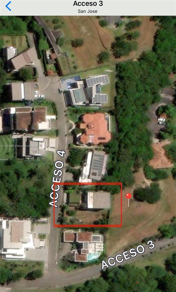 This is a satellite map view showing a residential property highlighted with a red rectangle — 46 Cerro Real Alto Las Palomas, CR, CR