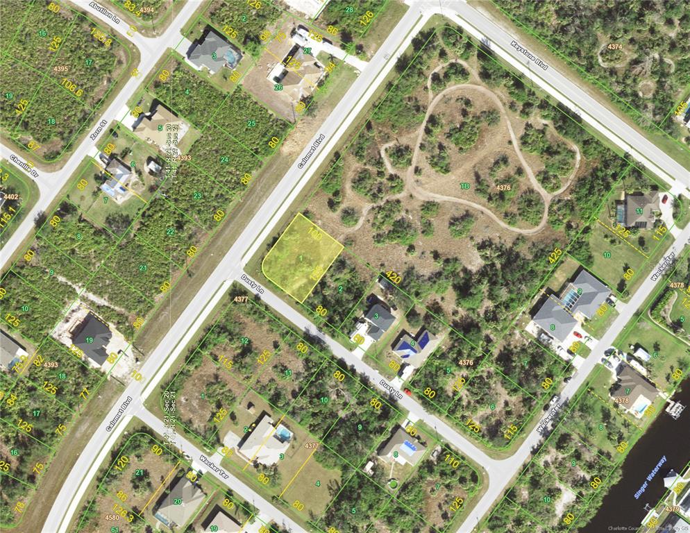 This is an aerial map showing a vacant lot highlighted in yellow near residential streets — 14022 DUSTY LANE, PORT CHARLOTTE, FL