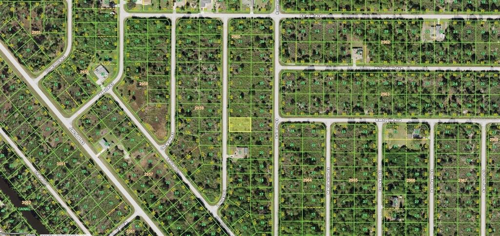This is an aerial map view showing a highlighted vacant lot within a residential subdivision — 2278 MCKAIG STREET, PORT CHARLOTTE, FL
