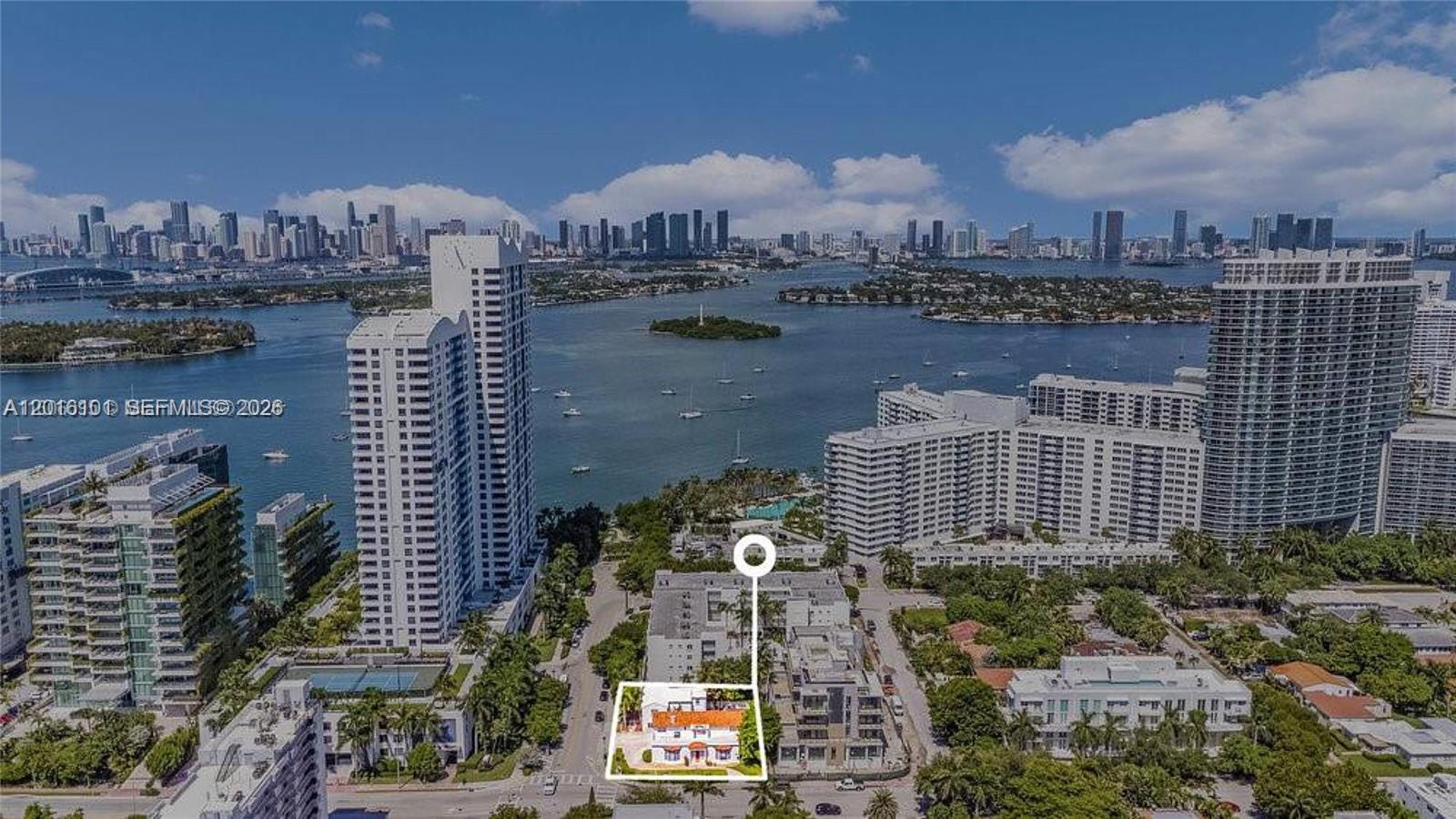 An aerial view shows a low-rise building highlighted in a white box near the waterfront — 1400 West Ave, Miami Beach FL 33139, MIAMI BEACH, FL