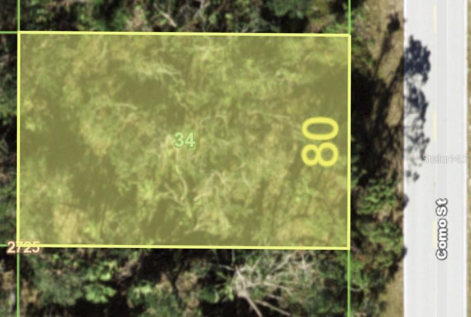 This is an aerial map showing a rectangular plot of land bordering a street — 3107 COMO STREET, PORT CHARLOTTE, FL