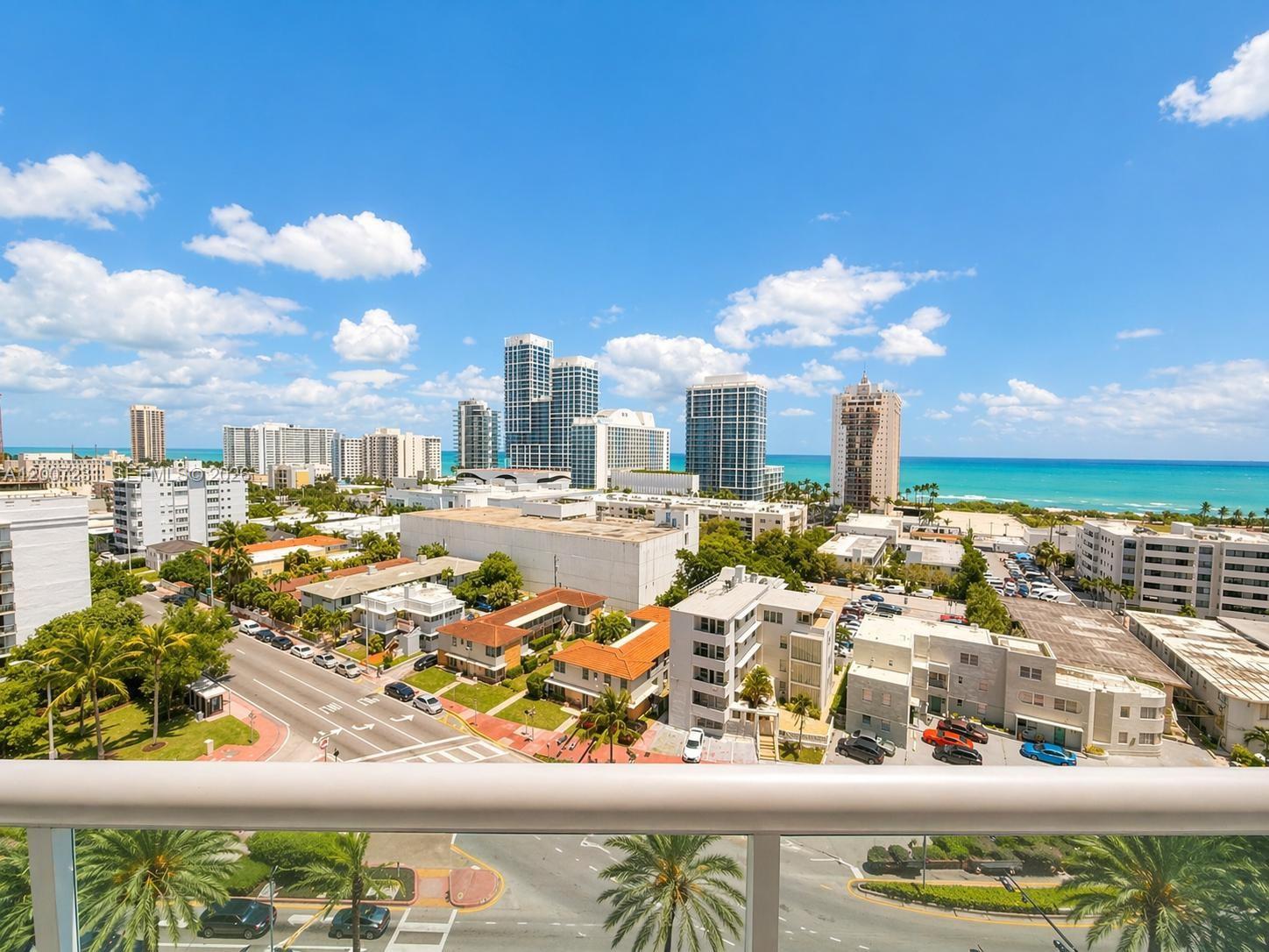 An elevated view of a coastal city skyline with high-rise buildings and the ocean — 6770 Indian Creek Dr # 12T, Miami Beach FL 33141, MIAMI BEACH, FL