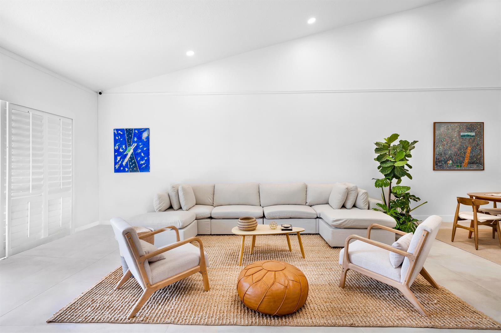 A bright living room features a large sectional sofa, two armchairs, and a jute rug — 4117 W Palm Aire Drive # B2, Pompano Beach FL 33069, POMPANO BEACH, FL