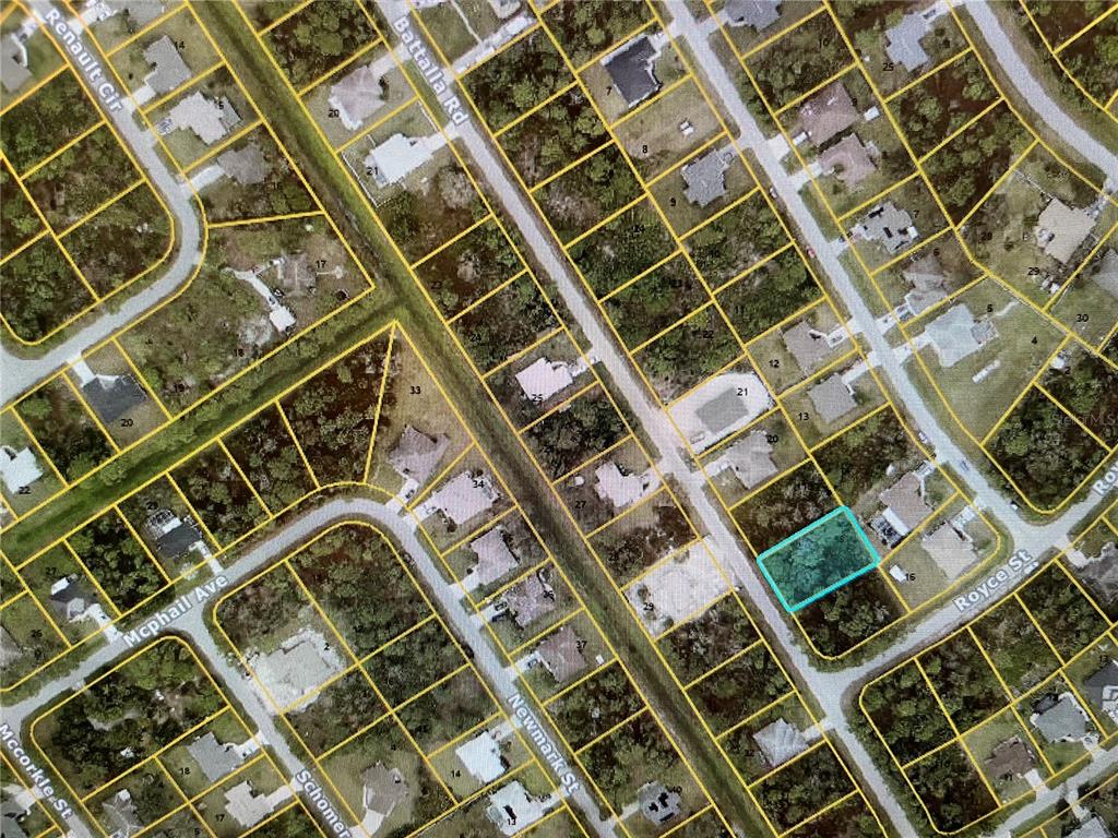 This is an aerial map showing a vacant residential lot highlighted in blue — LOT 18 BATALLA ROAD, NORTH PORT, FL