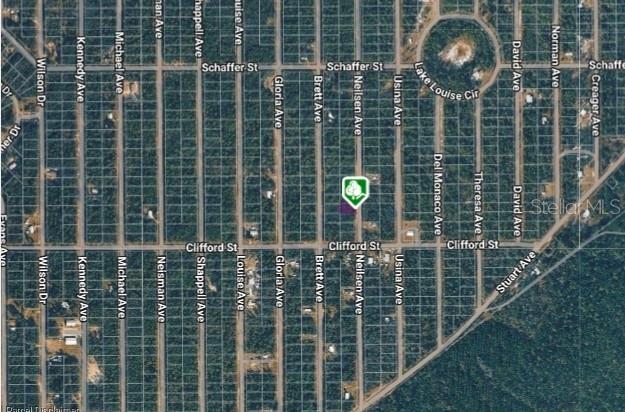 This is an aerial map showing a property location marked with a green icon — LOT 22 NEILSEN AVENUE, INTERLACHEN, FL