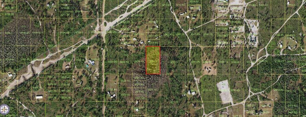 This is an aerial map showing a highlighted rectangular plot of land in a wooded area — HOLOPAW GROVES ROAD, ST CLOUD, FL