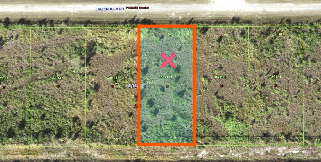 This is an aerial map showing a rectangular plot of land highlighted in orange — 511 CALENDULA DRIVE, INDIAN LAKE ESTATES, FL