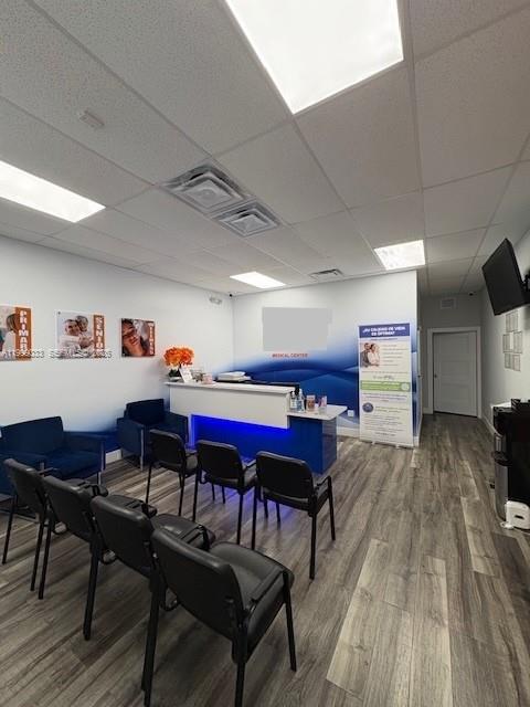 A medical center reception area features a front desk, waiting chairs, and wood-look flooring — 2701 SW 142nd Ave # 2705, Miami FL 33175, MIAMI, FL