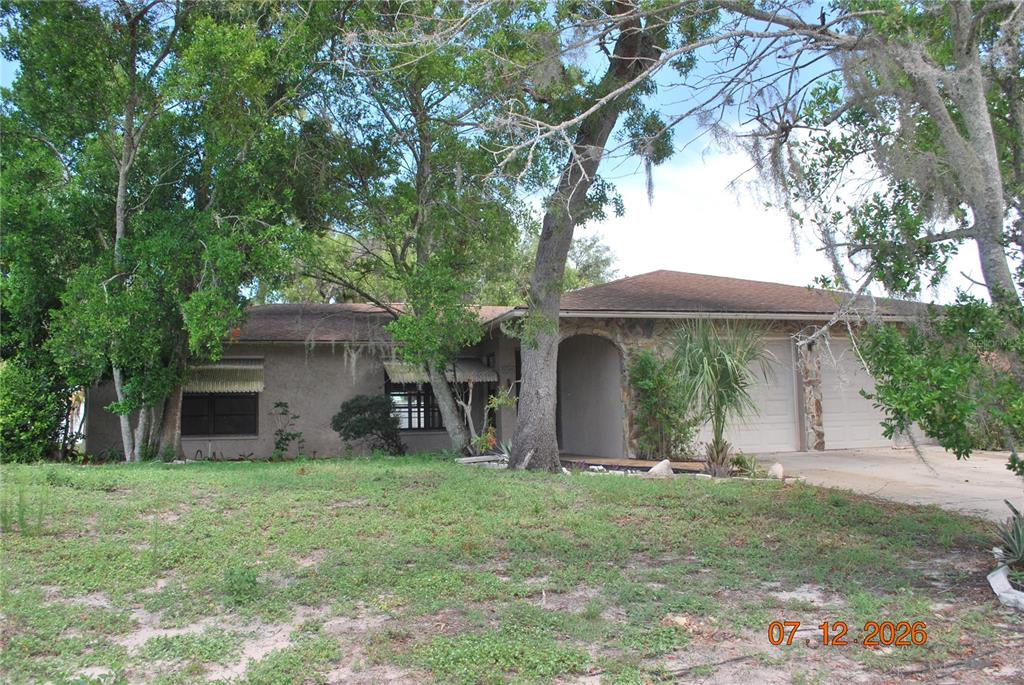 8941 FOREST LAKE DRIVE