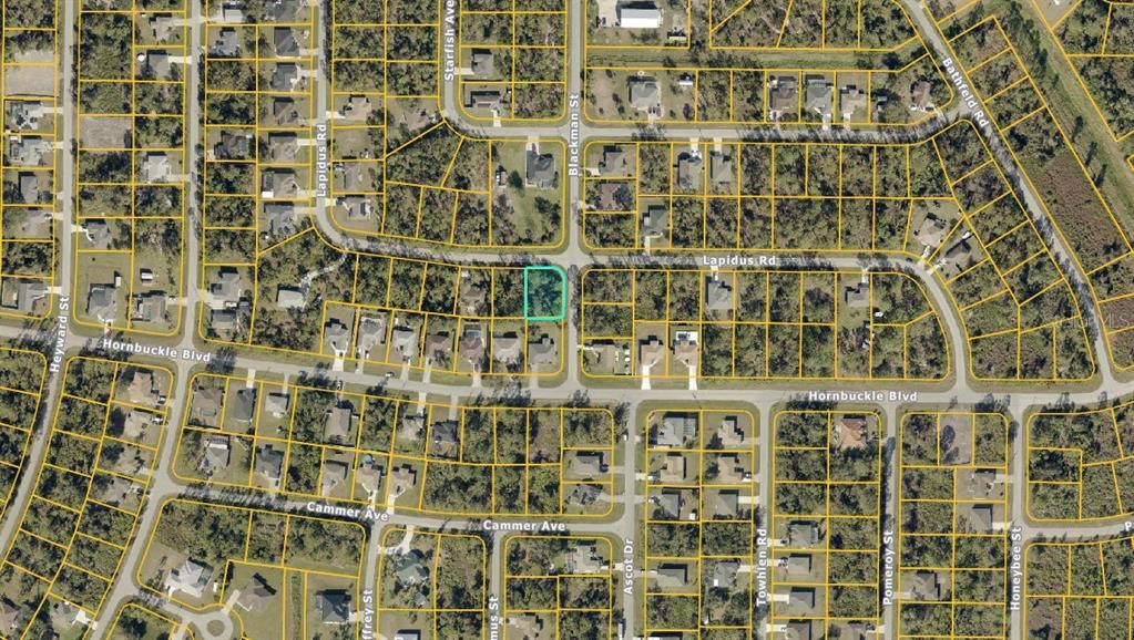 This is an aerial map view of a residential neighborhood with a highlighted vacant lot — Lot #25 BLACKMAN STREET, NORTH PORT, FL
