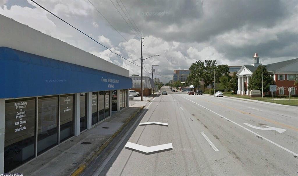 A street-level view shows a medical supply store with a blue awning beside a road — 915 S ORANGE AVENUE, ORLANDO, FL