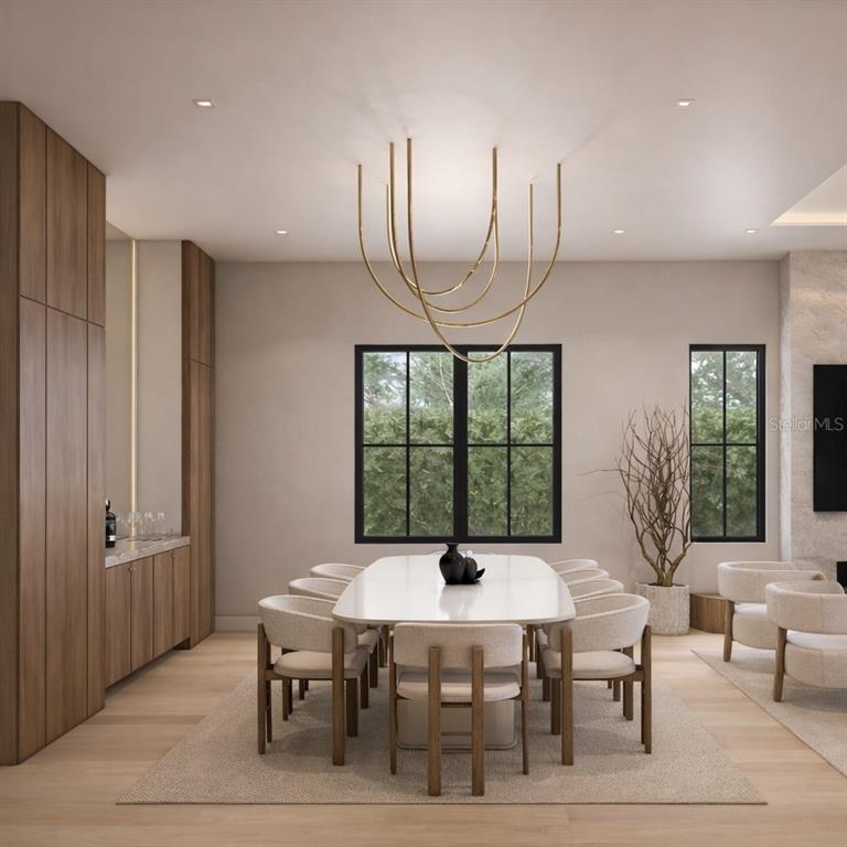 This rendering shows a modern dining room with a long table, chairs, and gold chandelier — 1432 W YALE STREET, ORLANDO, FL