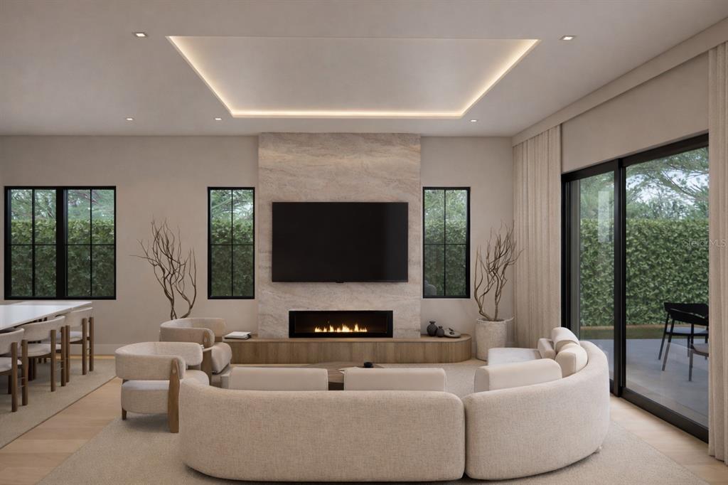 This rendering shows a modern living room with a stone fireplace, curved sofa, and recessed lighting — 1432 W YALE STREET, ORLANDO, FL