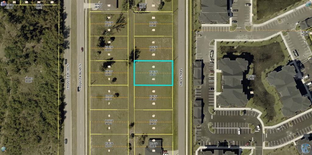 This is an aerial map showing a vacant rectangular lot highlighted in blue — 410 SW 15TH PLACE, CAPE CORAL, FL