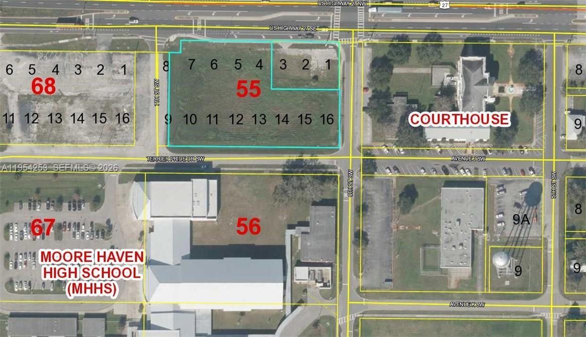 This is an aerial map showing a vacant lot highlighted in blue near a courthouse — 600 & 642 US HWY 27, Moore Haven FL 33471, MOORE HAVEN, FL