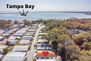 An aerial view shows a mobile home community located near the Tampa Bay waterfront — 585 SKY HARBOR DRIVE UNIT 126, CLEARWATER, FL