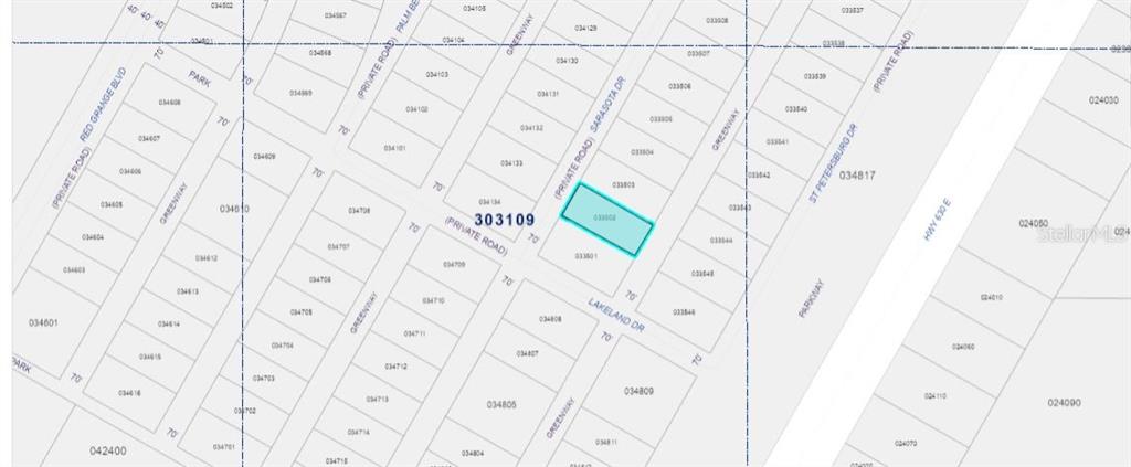This is a plat map showing a highlighted parcel of land surrounded by private roads — SARASOTA DRIVE, INDIAN LAKE ESTATES, FL