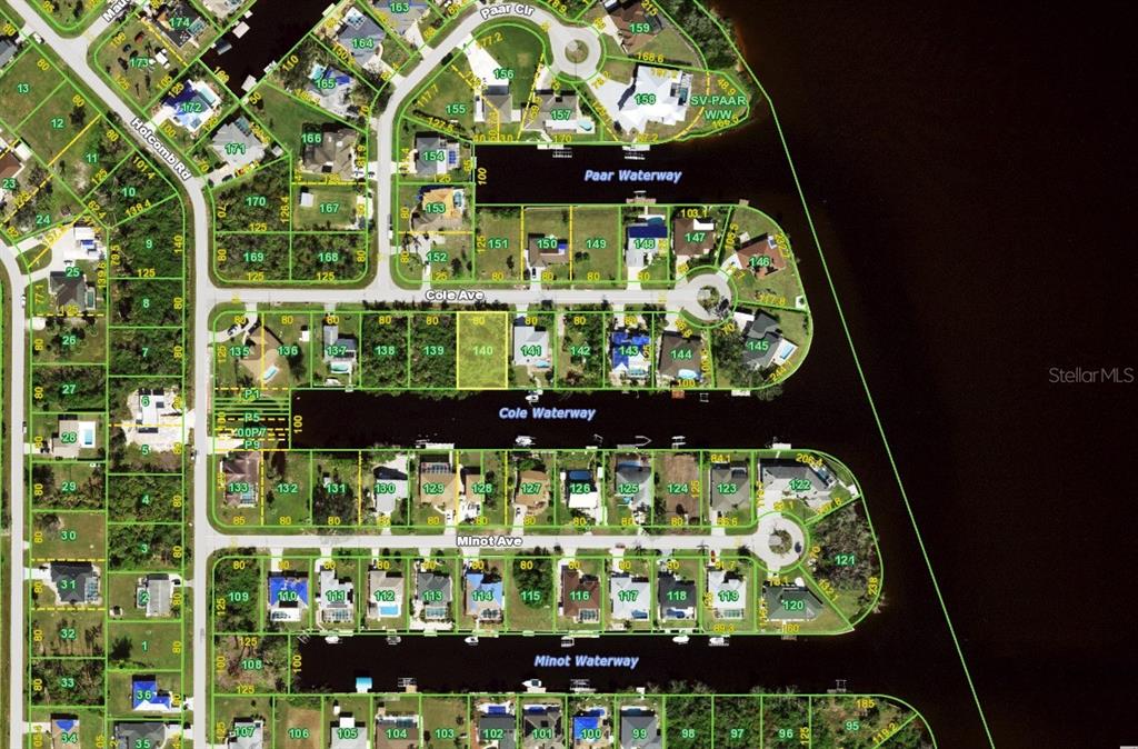This is an aerial map showing residential lots and waterways in a suburban neighborhood — 12379 COLE AVENUE, PORT CHARLOTTE, FL