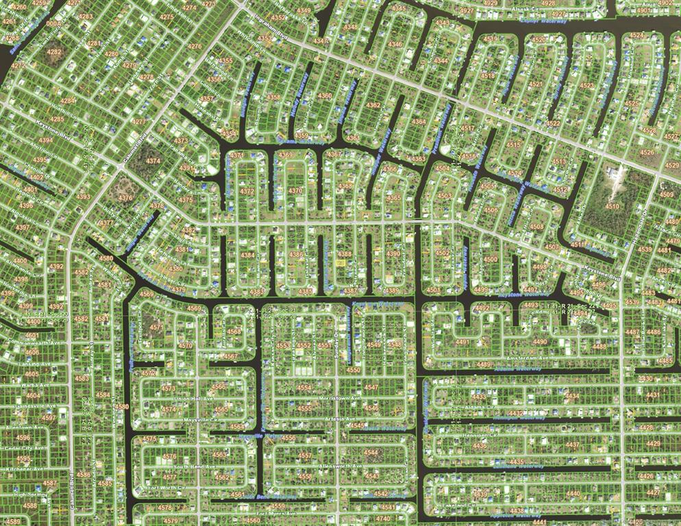 This is an aerial map showing a residential neighborhood with numerous houses and canals — 9629 NASTRAND CIRCLE, PORT CHARLOTTE, FL