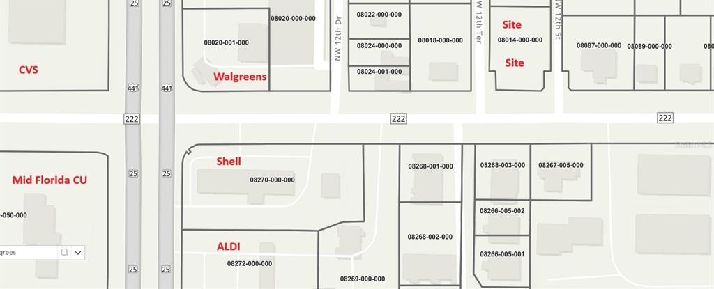 This image is a map showing property parcel boundaries and commercial locations along a roadway — 1202 NW 39TH AVENUE, GAINESVILLE, FL
