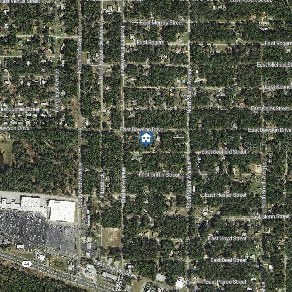 This is a satellite map showing a residential area with a house icon marker — 3061 E SCOFIELD STREET, INVERNESS, FL