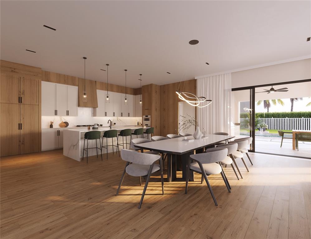 This rendering shows an open-concept kitchen and dining area with wood cabinetry and flooring — 1173 PRADO LANE, OAKLAND, FL