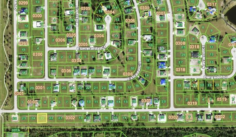 This is an aerial map view of a residential neighborhood with outlined property lots — 25051 DOREDO DRIVE, PUNTA GORDA, FL