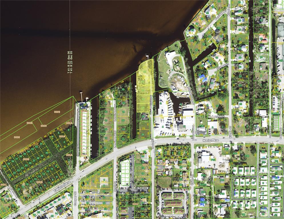 This is an aerial map showing residential lots, streets, and a waterfront area — 6141 ELLIOTT STREET, PUNTA GORDA, FL