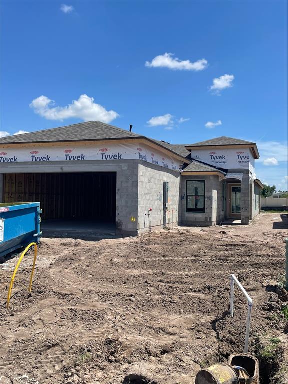 A single-story house under construction with a concrete block exterior and a garage — 12361 OAK  HILL WAY, PARRISH, FL