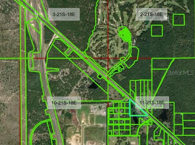 An aerial map shows property boundaries outlined in green over a wooded area and roads — 17297 PONCE DE LEON BOULEVARD, BROOKSVILLE, FL