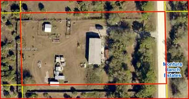An aerial view shows a rectangular property lot with a house, outbuildings, and dirt driveway — 640 N Kennel St, Clewiston FL 33440, CLEWISTON, FL
