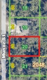 This is a satellite map view showing a vacant residential lot outlined in red — 376 MUNOZ STREET, PORT CHARLOTTE, FL