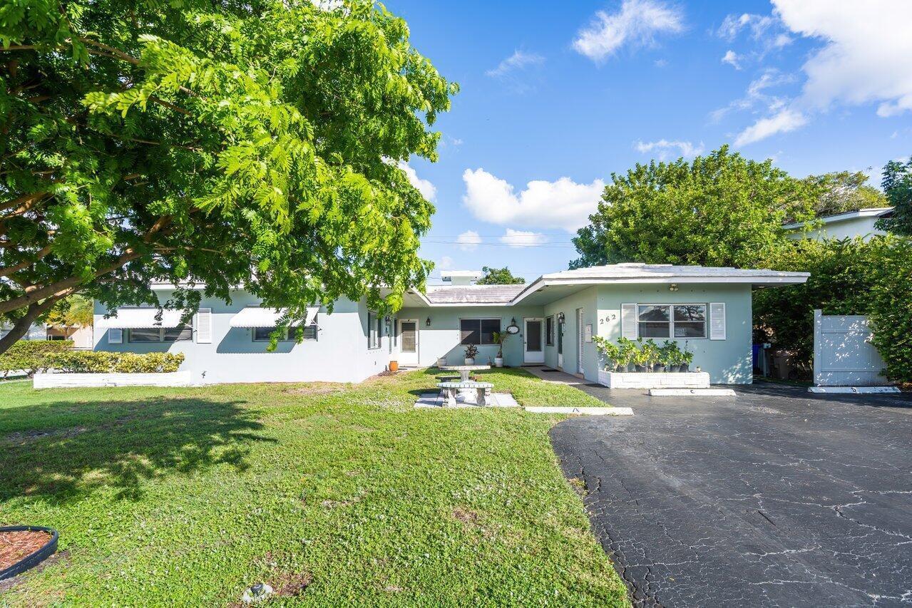 A light green single-story house with a flat roof and a paved driveway — 262 SE 9th Avenue # 4, Deerfield Beach FL 33441, DEERFIELD BEACH, FL