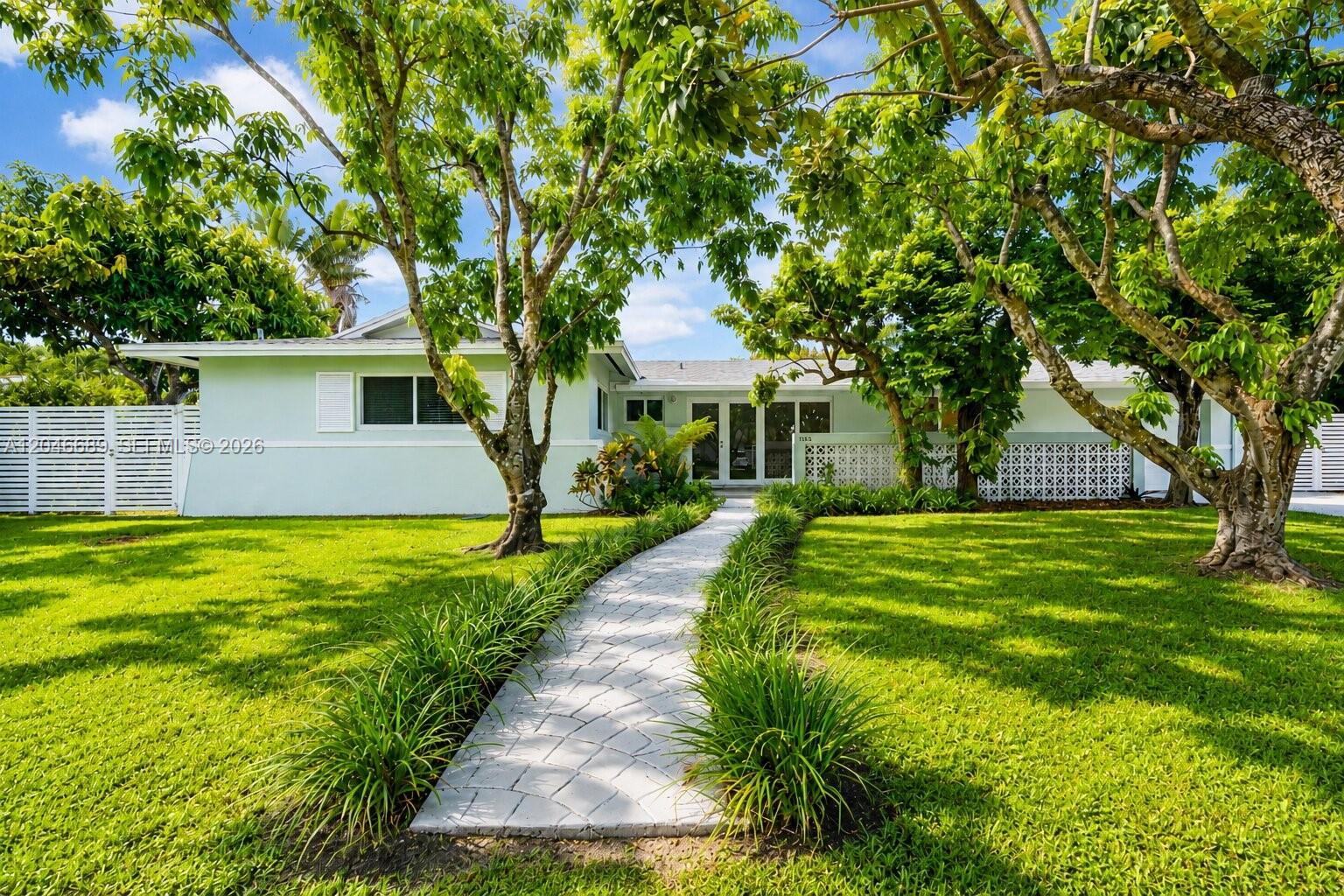A single-story house with a white stone walkway leading to the front entrance — 7982 SW 89th St # 7982, Miami FL 33156, MIAMI, FL