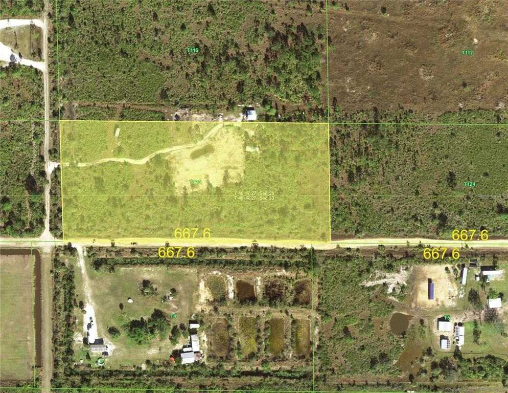 An aerial map view shows a rectangular plot of land highlighted in yellow — 50404 BERMONT ROAD, PUNTA GORDA, FL